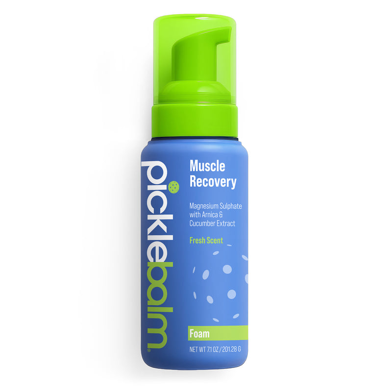 Blue bottle of Picklebalm Muscle Recovery Foam with green pump on a white background